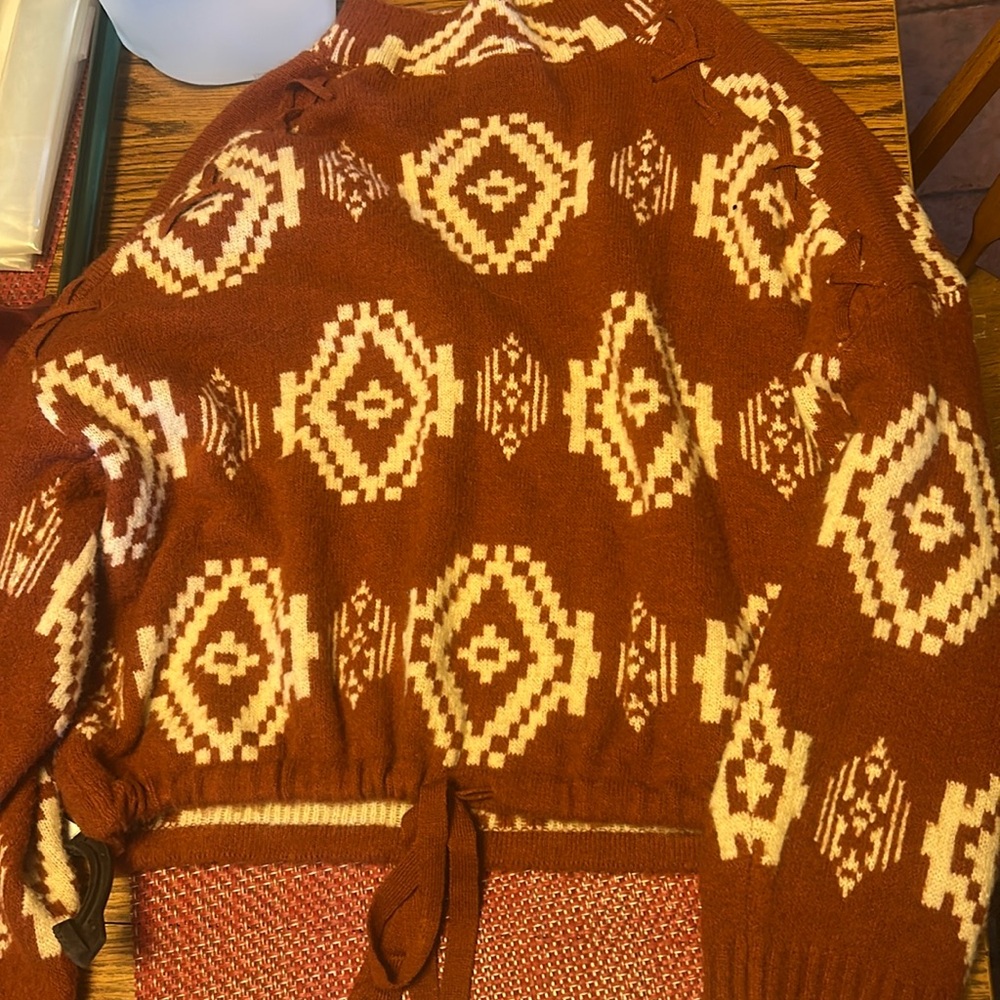 sweater xxxL but runs really small red with a design